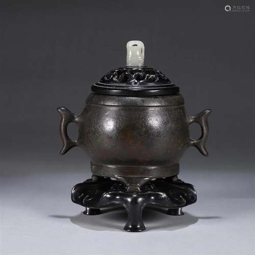 A copper censer with fish shaped ears