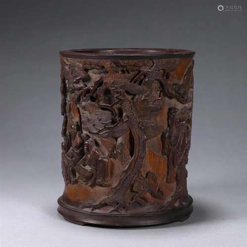 A figure carved bamboo brush pot