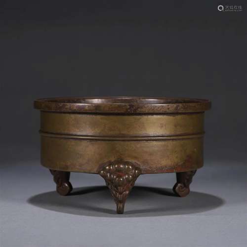 A copper censer with beast shaped legs