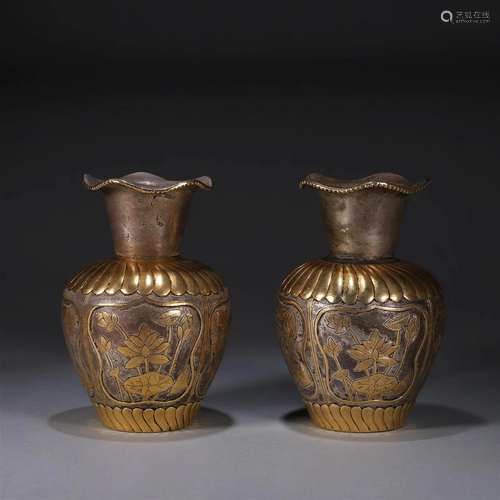 A pair of lotus patterned gilding silver vases