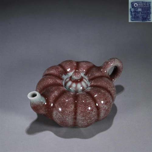 A red glaze porcelain pumpkin shaped pot