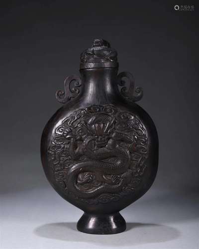 A dragon patterned red sandalwood flask