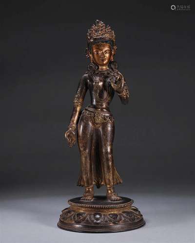 A gilding copper buddha statue