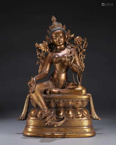 A gilding copper buddha statue