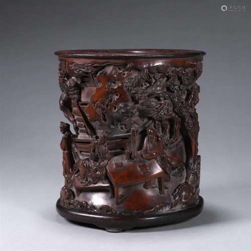 A figure carved bamboo brush pot