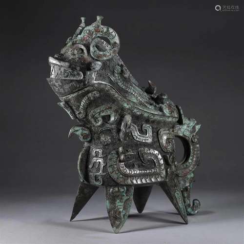 A dragon patterned bronze goat head pot