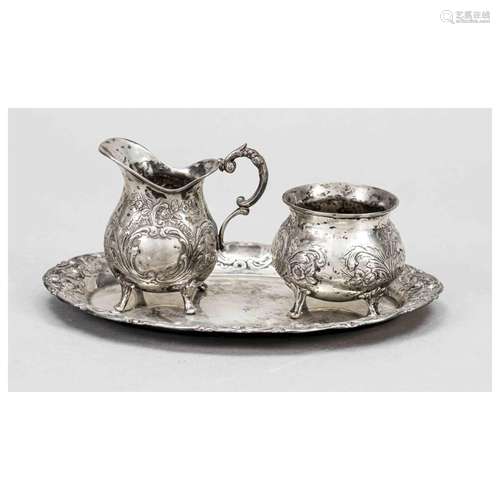 Cream and sugar vessel on oval tray,