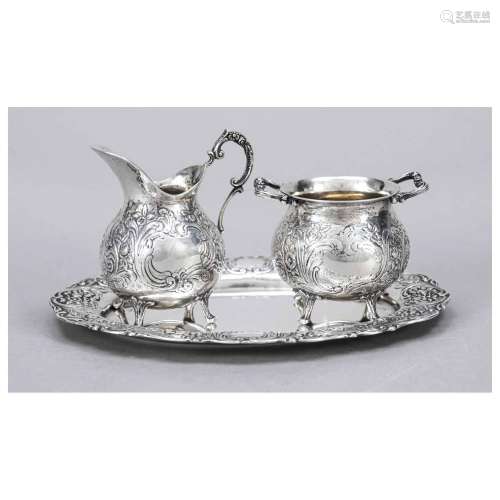 Cream and sugar vessel on oval tray,