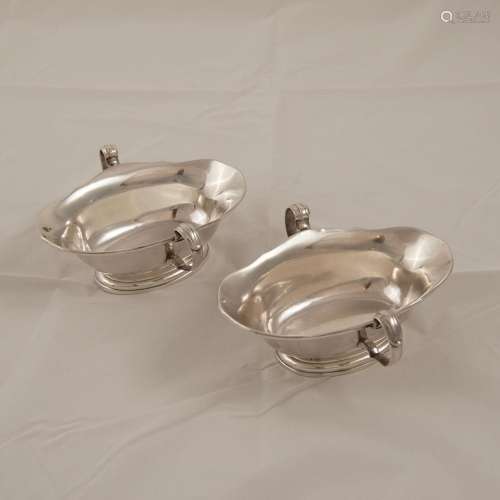 Pair of silver Saucers