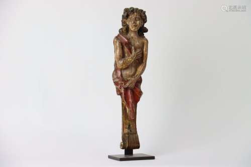 Terme en bois sculpté et polychromé. Hauteur : 42 cm. (accid...