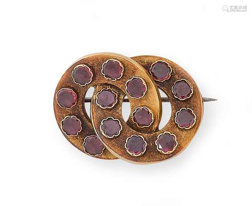 Broche en or jaune, composée de deux éléments circulaires en...