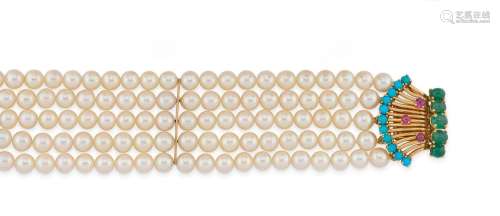 Bracelet composé de quatre rangs de perles de culture. Le fe...