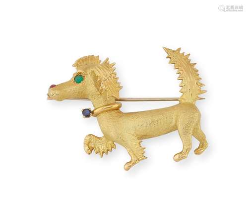 Broche « Chien » en or jaune martelé, serti d’une émeraude, ...