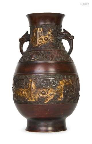 A CHINESE GILT BRONZE ARCAHIC SHAPED VASE, 17TH/18TH CENTURY...