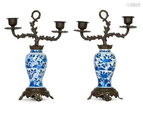 A PAIR OF CHINESE & BRONZE MOUNTED CANDLEABARS, KANGXI P...