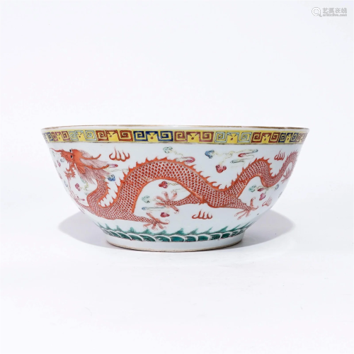 A famille rose large bowl with dragon and phoenix patterns i...