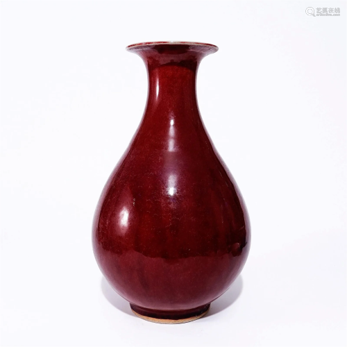 A red glaze vase in the Qing Dynasty