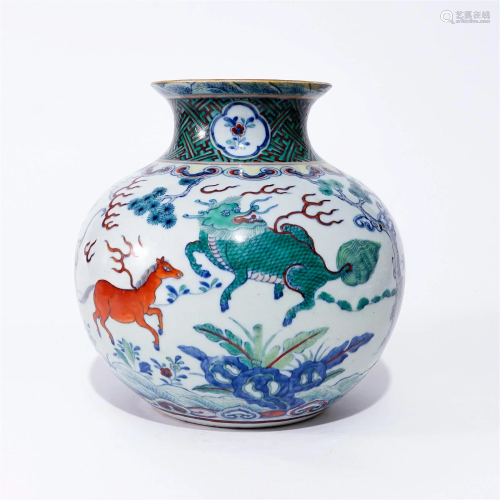 A contrasting color jar with animal patterns in the Qing Dyn...
