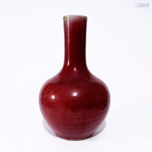 A red glaze spherical vase in the Qing Dynasty