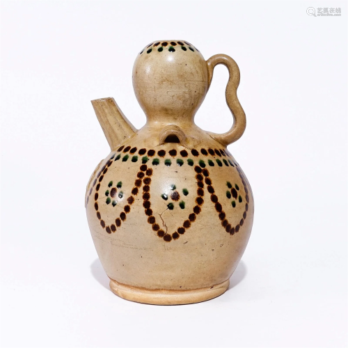 A Changsha ware pot with patterns in the Tang Dynasty
