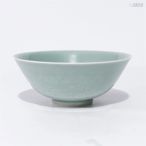 A celadon bowl with carved design in the Jiaqing period of t...