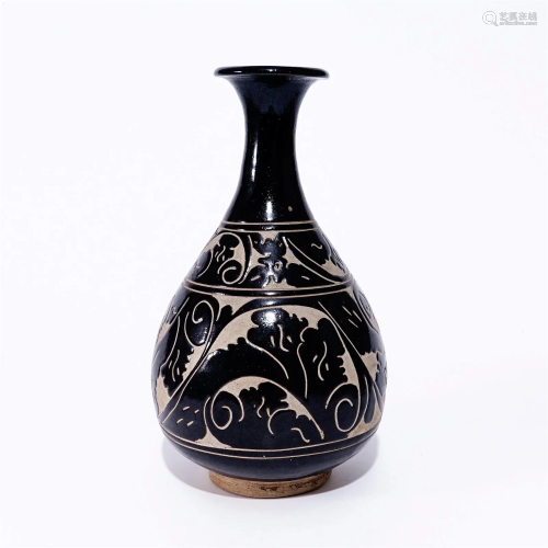 A vase with carved design in the Yuan Dynasty