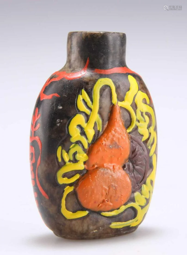 A CHINESE CARVED AND PAINTED STONE SNUFF BOTTLE, 19TH CENTUR...