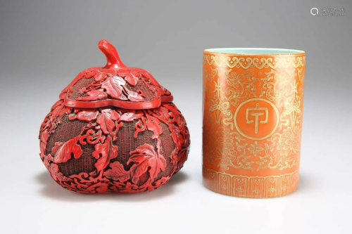 A CHINESE CINNABAR LACQUER BOX AND A CHINESE PORCELAIN BRUSH...