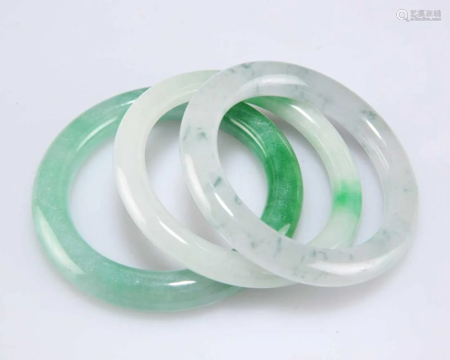 THREE CHINESE JADE BANGLES