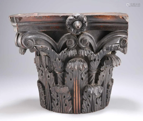 AN 18TH CENTURY CARVED WALNUT CORINTHIAN CAPITAL