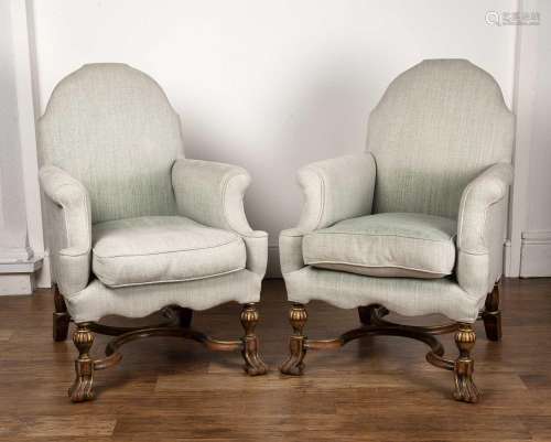 Pair of Howard and Sons chairs circa 1925, in the William an...