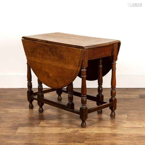 Oak gateleg/drop leaf table 19th Century, standing on ring t...