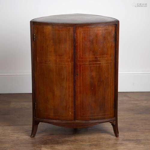 Mahogany and inlaid triangular cupboard 19th Century, with t...