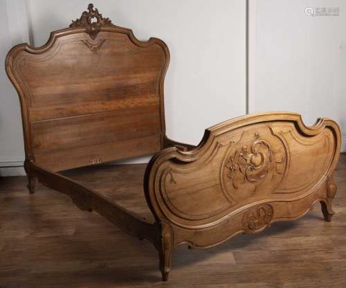 Walnut carved double bedstead French, late 19th Century, wit...