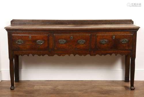 Oak dresser base early 19th Century, fitted with three drawe...