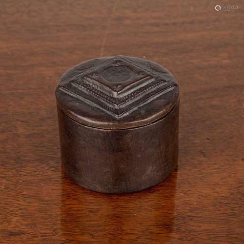 Small leather cylindrical box with impressed decoration incl...