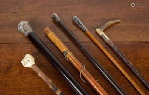 Collection of Victorian and later walking canes and riding c...