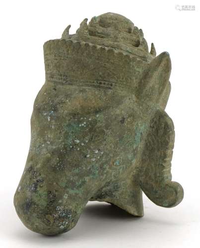 Chino Tibetan patinated bronze head of a mythical animal, 16...