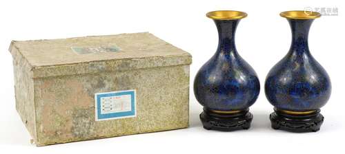 Pair of Chinese cloisonne vases with hardwood stands and box...