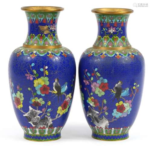 Pair of Chinese cloisonne vases enamelled with birds amongst...