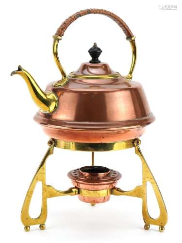 Arts & Crafts style copper and brass teapot on stand wit...