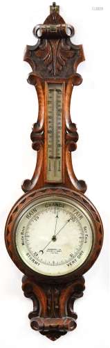 Carved oak barometer, the dial inscribed Chadburns Ltd, 47 C...