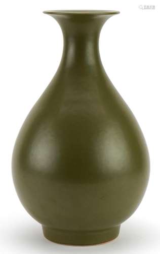Chinese porcelain vase having a green glaze, six figure char...