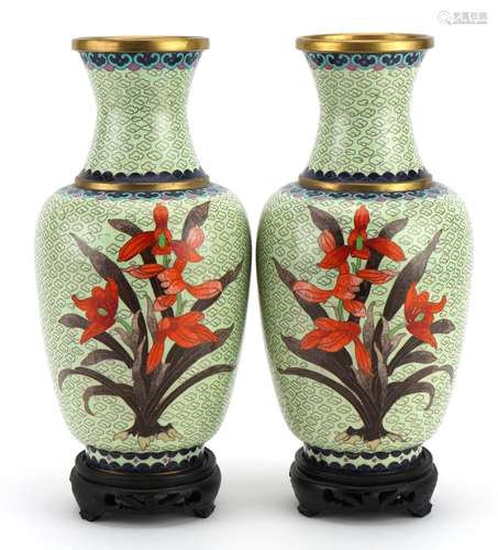 Pair of Chinese cloisonne vases raised on hardwood stands, e...