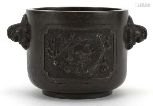 Chinese patinated bronze censer with twin handles cast with ...