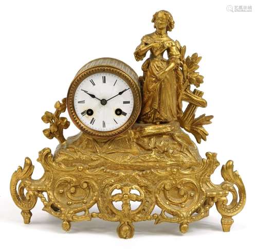 French gilt metal striking mantle clock mounted with a femal...