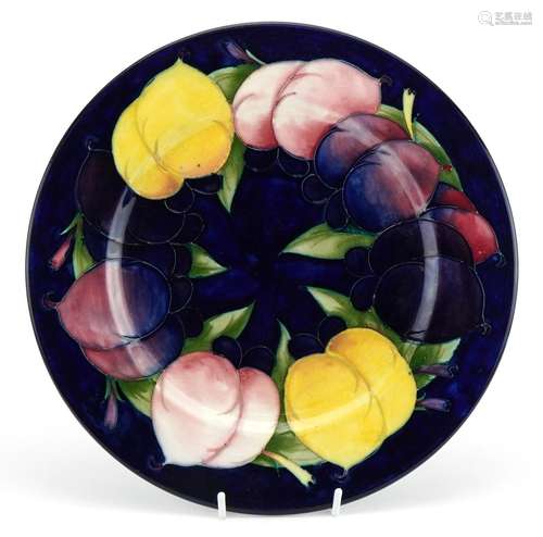 Moorcroft pottery plate hand painted with fruit, signed to t...