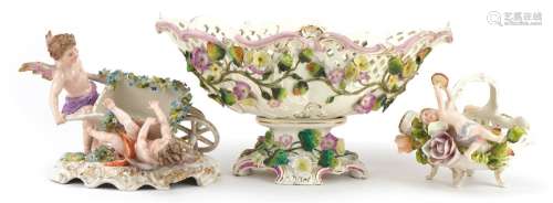 German floral encrusted porcelain including a centrepiece an...