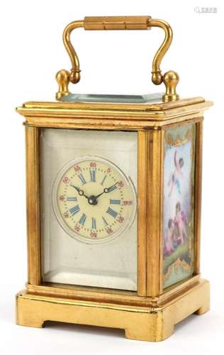 Miniature brass carriage clock with porcelain panels and Rom...