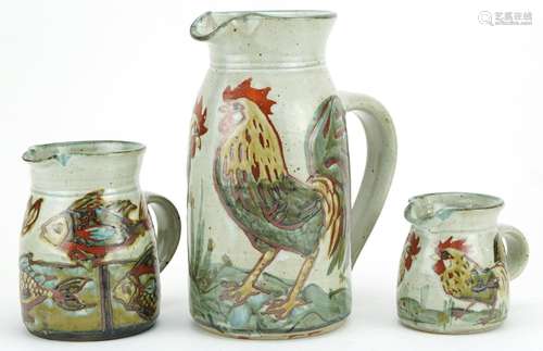 Colin Kellam, Three studio pottery jugs hand painted with co...